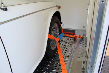 Safe and secure overwheel tie down